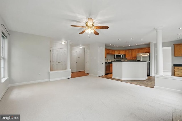 538 Colony Ct, Warrenton, VA 20186 - unfurnished living room featuring a ceiling fan, ornate columns, light colored carpet, baseboards, and recessed lighting