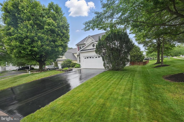 538 Colony Ct, Warrenton, VA 20186 - view of property hidden behind natural elements with asphalt driveway, a front lawn, and a garage