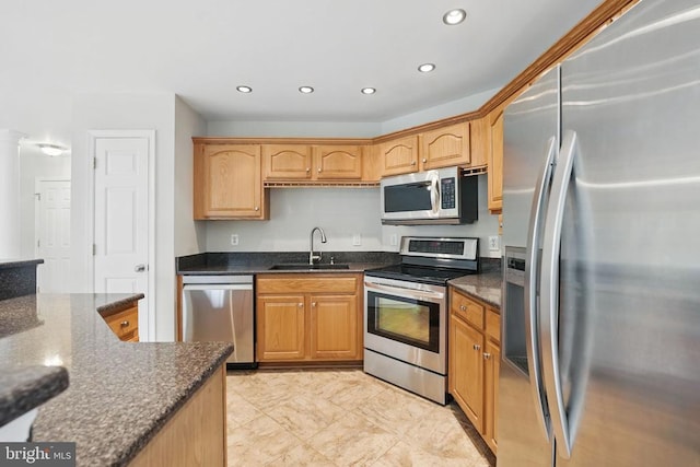 538 Colony Ct, Warrenton, VA 20186 - kitchen featuring appliances with stainless steel finishes, a sink, recessed lighting, and dark stone counters