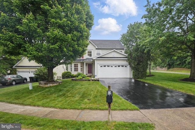 538 Colony Ct, Warrenton, VA 20186 - view of front of house with asphalt driveway, a front yard, and an attached garage