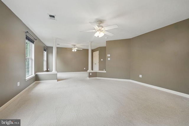 538 Colony Ct, Warrenton, VA 20186 - empty room featuring ornate columns, a ceiling fan, carpet floors, and baseboards