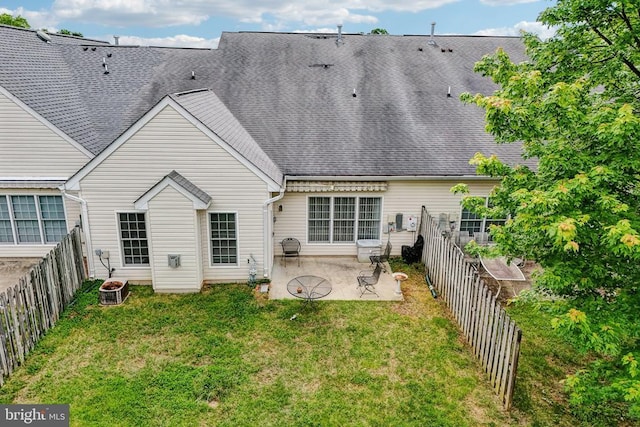 rear view of house featuring a patio area