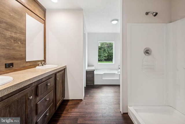 8708 Berkeley Farms Ln, Partlow, VA 22534 - full bath with double vanity, a shower, wood finished floors, and a sink