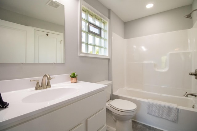 full bathroom with toilet, vanity, shower / bath combination, and recessed lighting