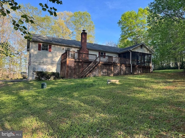 11068 Alum Springs Rd, Culpeper, VA 22701 - rear view of property with a sunroom, a deck, stairs, a chimney, and a yard