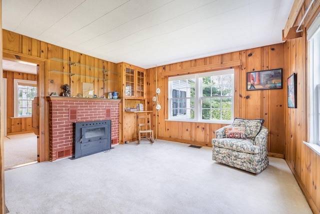 2860 Uphill Dr, Broadway, VA 22815 - living area featuring wooden walls, carpet floors, and baseboards