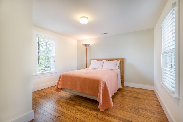 2860 Uphill Dr, Broadway, VA 22815 - bedroom featuring light wood-type flooring and baseboards