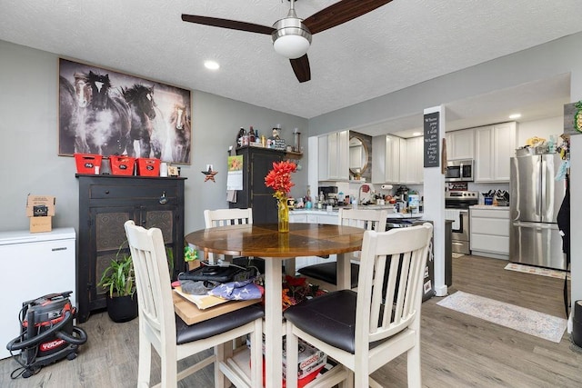 120 Gay St W, Staunton, VA 24401 - dining space featuring light wood-style flooring, ceiling fan, a textured ceiling, and recessed lighting
