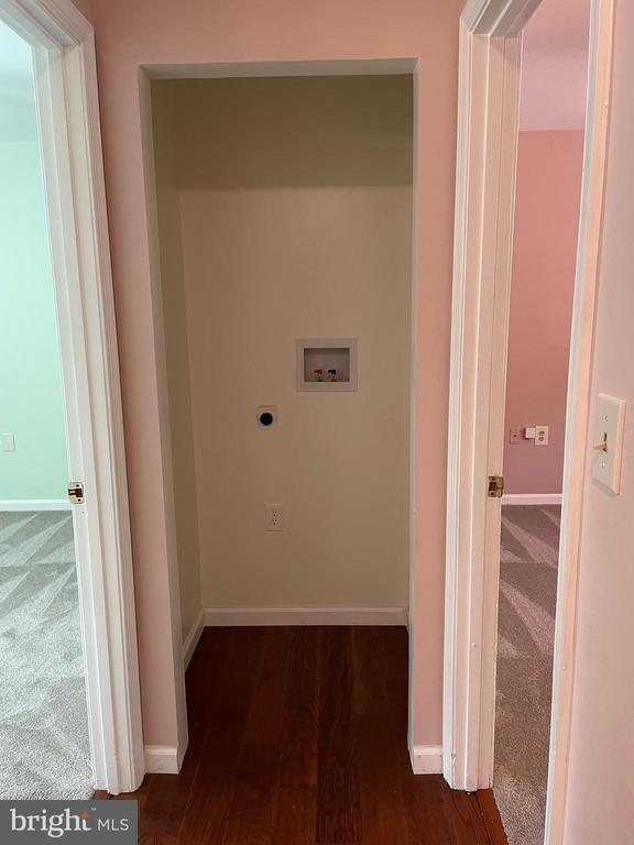 4504 Mine Rd, Fredericksburg, VA 22408 - laundry area featuring hookup for an electric dryer, washer hookup, baseboards, and wood finished floors
