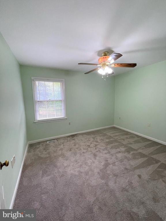 4504 Mine Rd, Fredericksburg, VA 22408 - unfurnished room with carpet floors, ceiling fan, and baseboards