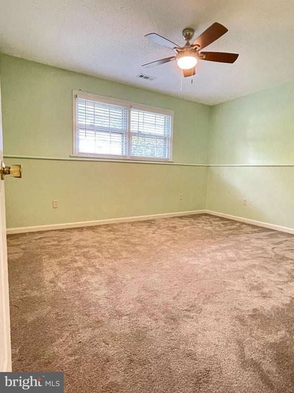 4504 Mine Rd, Fredericksburg, VA 22408 - carpeted empty room with ceiling fan and baseboards