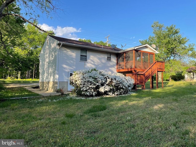 4504 Mine Rd, Fredericksburg, VA 22408 - back of property featuring a sunroom, stairway, and a lawn
