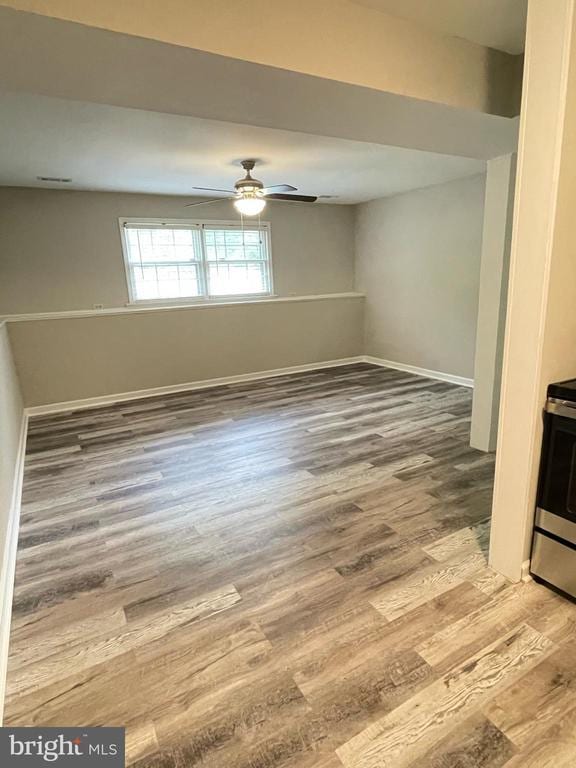 4504 Mine Rd, Fredericksburg, VA 22408 - spare room featuring a ceiling fan, wood finished floors, and baseboards