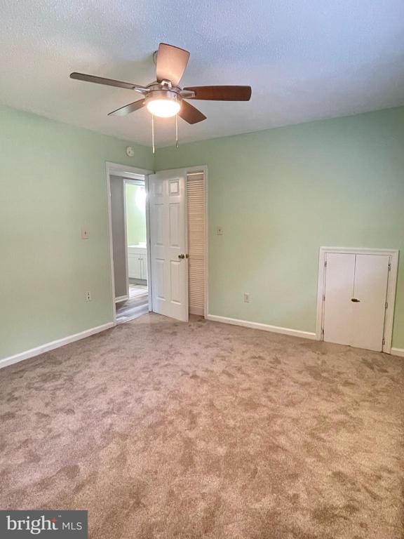 4504 Mine Rd, Fredericksburg, VA 22408 - carpeted empty room featuring ceiling fan and baseboards