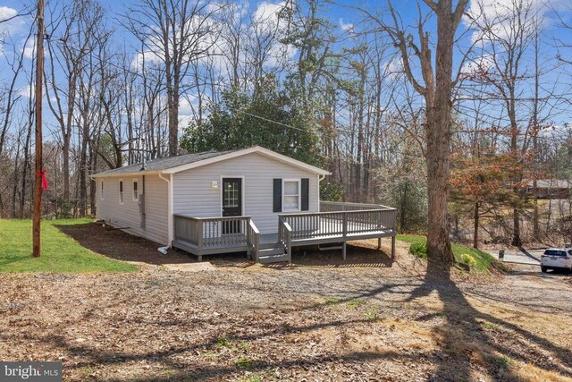2215 Hoover Rd W, Haywood, VA 22722 - view of home's exterior featuring a deck and view of scattered trees