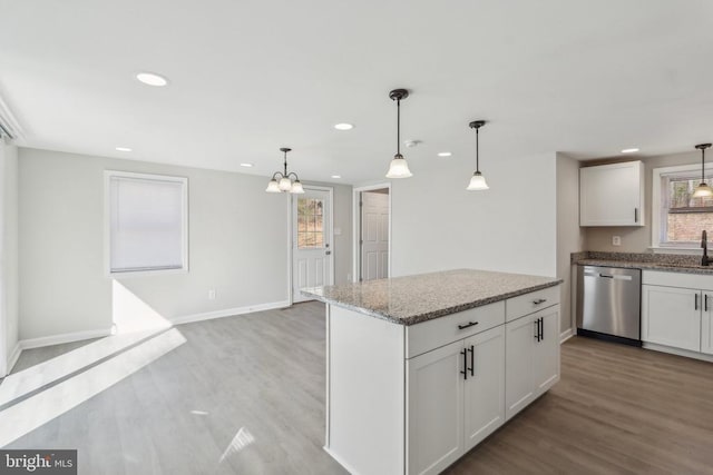 2215 Hoover Rd W, Haywood, VA 22722 - kitchen featuring stainless steel dishwasher, light wood-style floors, recessed lighting, light stone counters, and baseboards
