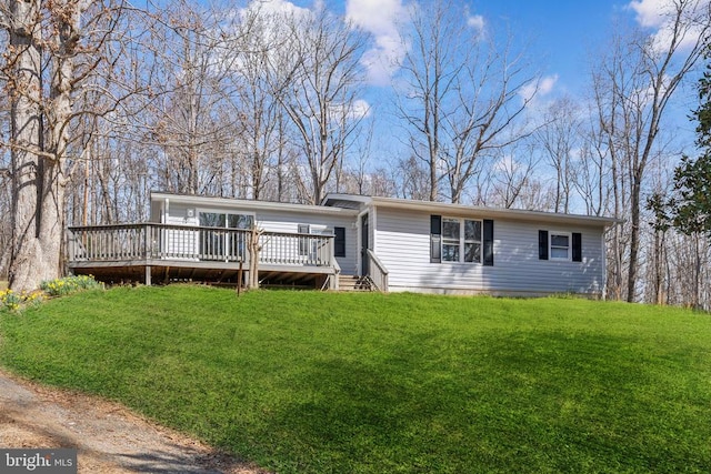 2215 Hoover Rd W, Haywood, VA 22722 - view of front of house featuring a wooden deck and a front yard
