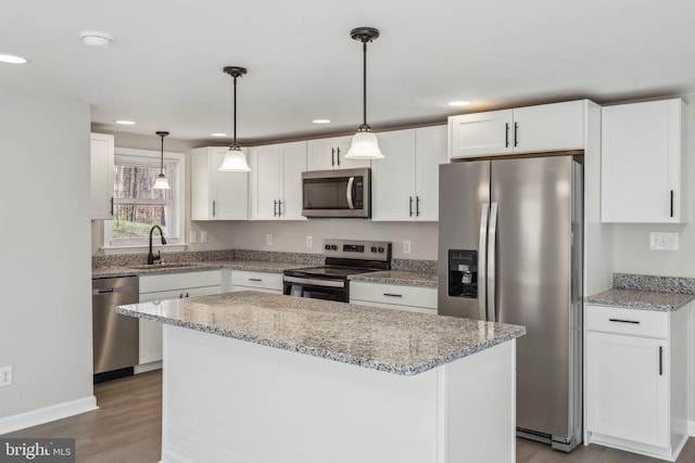 2215 Hoover Rd W, Haywood, VA 22722 - kitchen featuring stainless steel appliances, a sink, white cabinetry, a kitchen island, and recessed lighting