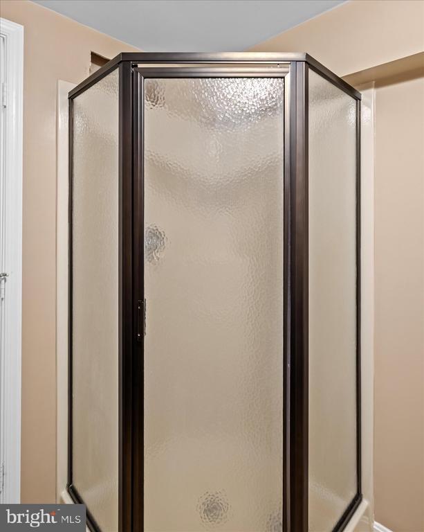 1117 Poor House Rd, Banco, VA 22711 - bathroom featuring a stall shower