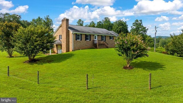 1117 Poor House Rd, Banco, VA 22711 - ranch-style home featuring a chimney and brick siding