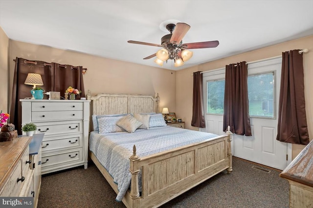 1117 Poor House Rd, Banco, VA 22711 - bedroom with dark carpet and ceiling fan