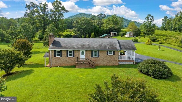 1117 Poor House Rd, Banco, VA 22711 - single story home featuring a front lawn, brick siding, a chimney, and crawl space