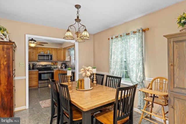 1117 Poor House Rd, Banco, VA 22711 - dining room featuring a chandelier and a ceiling fan