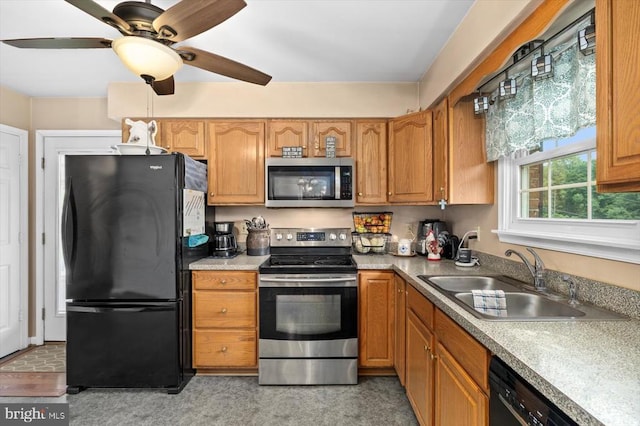 1117 Poor House Rd, Banco, VA 22711 - kitchen featuring black appliances, a ceiling fan, light countertops, and brown cabinetry