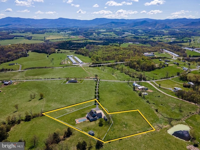 drone / aerial view with a rural view and a mountain view