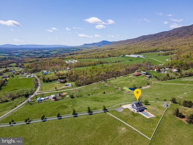 aerial view featuring a rural view and a mountain view