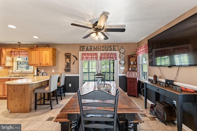 dining area featuring light tile patterned flooring, ceiling fan, and recessed lighting