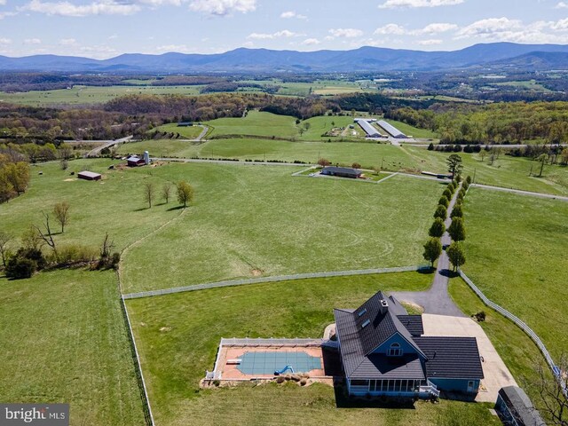 birds eye view of property featuring a rural view and a mountain view