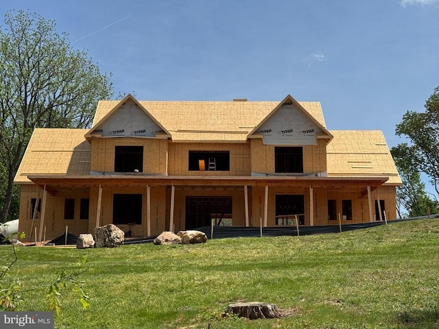  - back of house with a yard