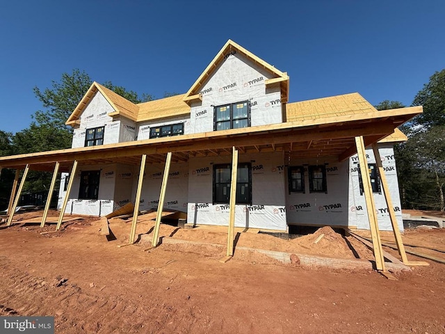  - unfinished property with a porch