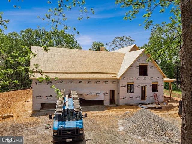  - unfinished property featuring a chimney