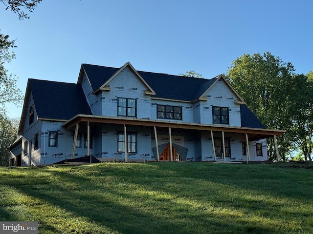  - view of front of property featuring a front yard