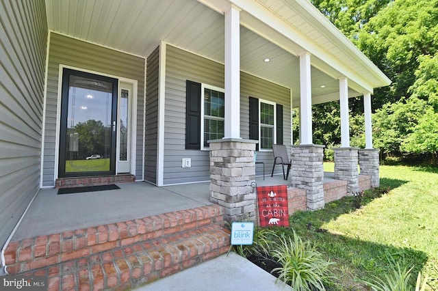 1835 Mill Creek Xrds, Luray, VA 22835 - doorway to property featuring covered porch and a yard