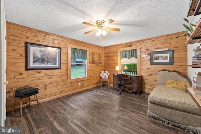 468 George James Loop, Radiant, VA 22732 - sitting room featuring wood finished floors, a textured ceiling, wood walls, baseboards, and ceiling fan