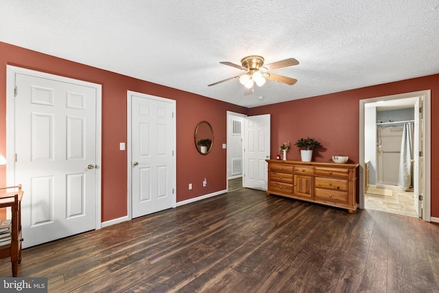 468 George James Loop, Radiant, VA 22732 - bedroom with wood finished floors, a textured ceiling, visible vents, baseboards, and ensuite bathroom