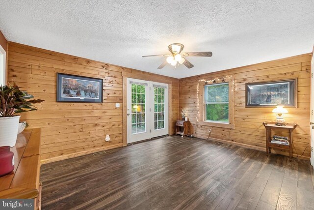468 George James Loop, Radiant, VA 22732 - unfurnished room with ceiling fan, hardwood / wood-style flooring, a textured ceiling, and wooden walls