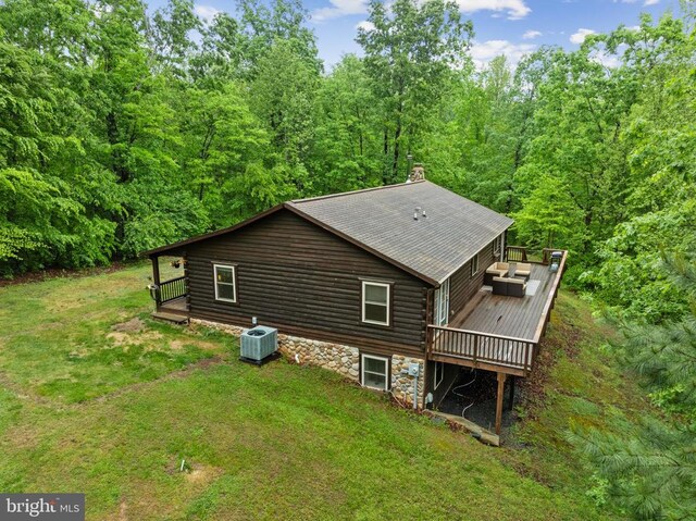 468 George James Loop, Radiant, VA 22732 - back of property with a yard, a deck, a chimney, and log siding