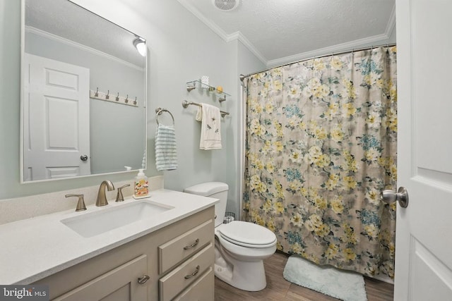  - full bath with a textured ceiling, vanity, ornamental molding, wood finished floors, and curtained shower