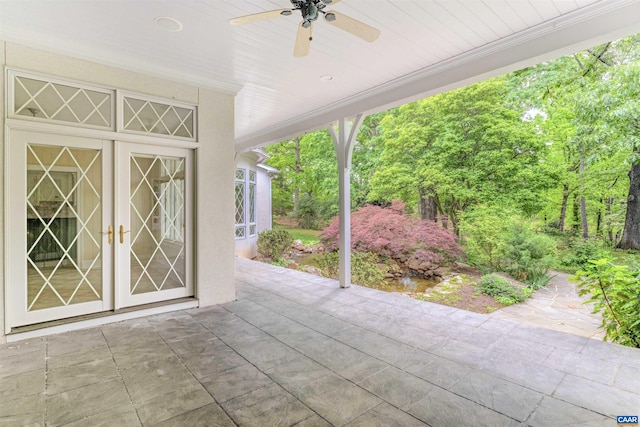 view of patio / terrace featuring french doors and ceiling fan