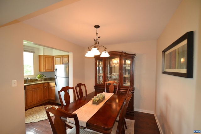 1606 Monticello Ave Unit G, Charlottesville, VA 22902 - dining area featuring dark wood-style flooring and a chandelier