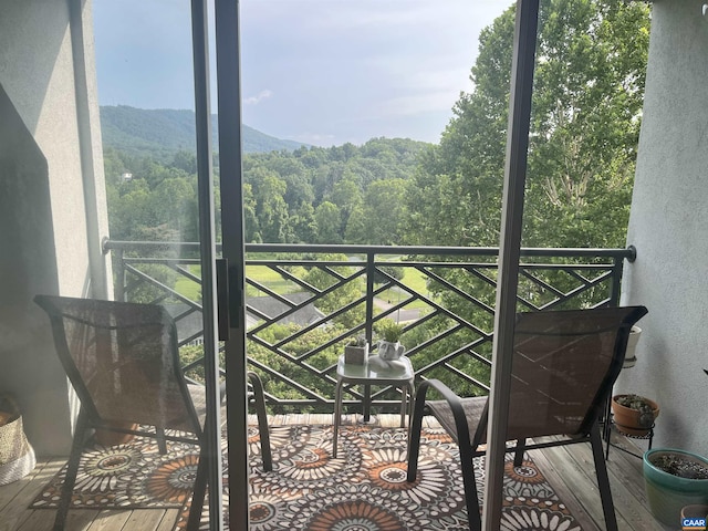 1606 Monticello Ave Unit G, Charlottesville, VA 22902 - balcony featuring a wooded view