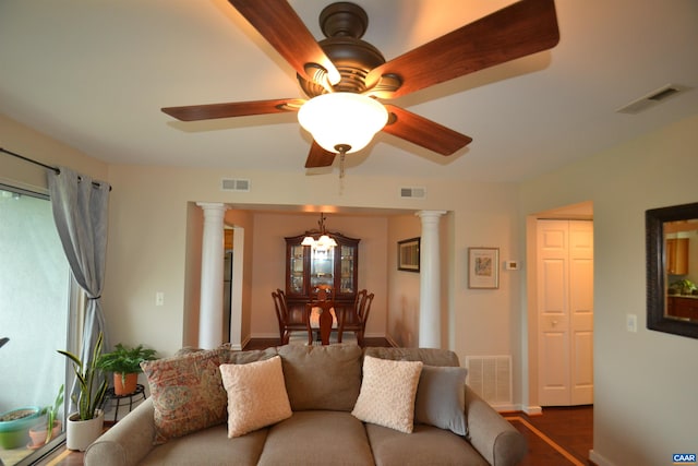 1606 Monticello Ave Unit G, Charlottesville, VA 22902 - living area featuring decorative columns, a chandelier, and a ceiling fan
