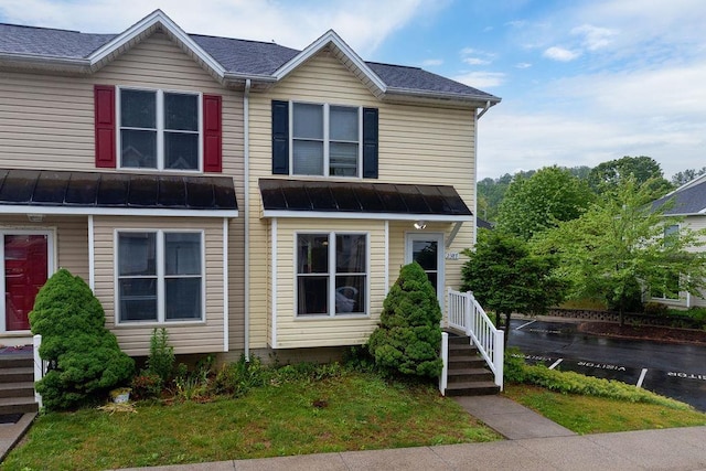 2387 King Arthurs Ct, Harrisonburg, VA 22801 - view of front of house with a standing seam roof, metal roof, and roof with shingles