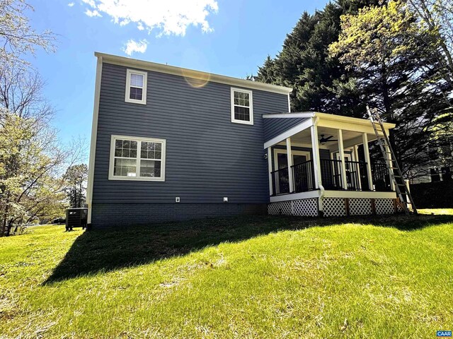 276 Rustling Oaks Way, Ruckersville, VA 22968 - back of house featuring a lawn, ceiling fan, and cooling unit