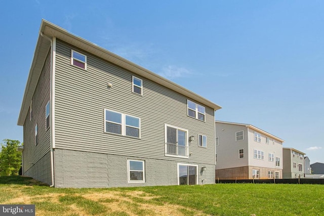 35614 Pine Needle Ln, Locust Grove, VA 22508 - back of house featuring a lawn