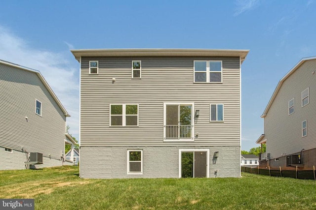 35614 Pine Needle Ln, Locust Grove, VA 22508 - rear view of house featuring a yard and central AC